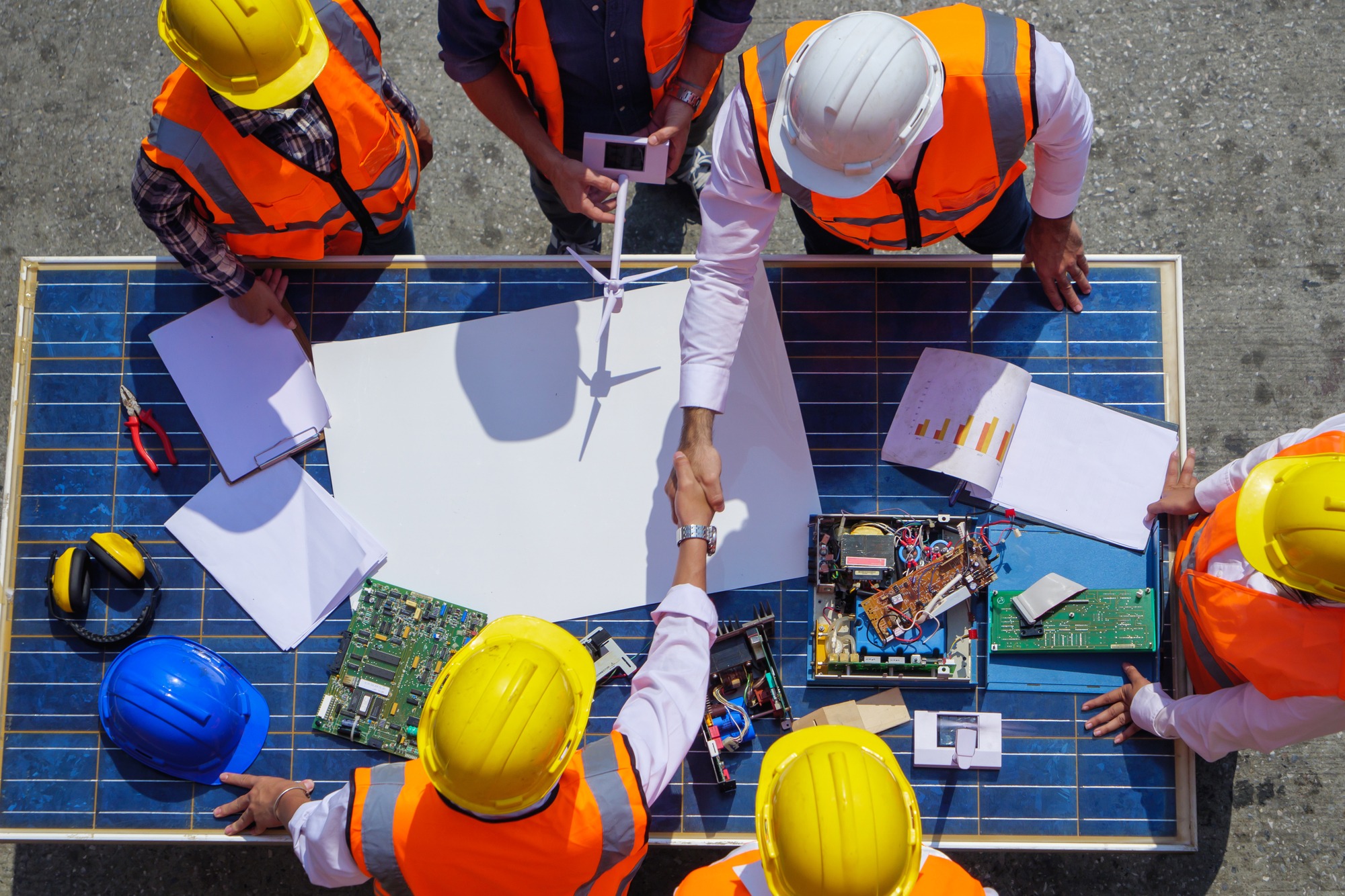 engineers doing a meeting about solar panel